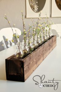 centro-mesa-botellas-y-flores